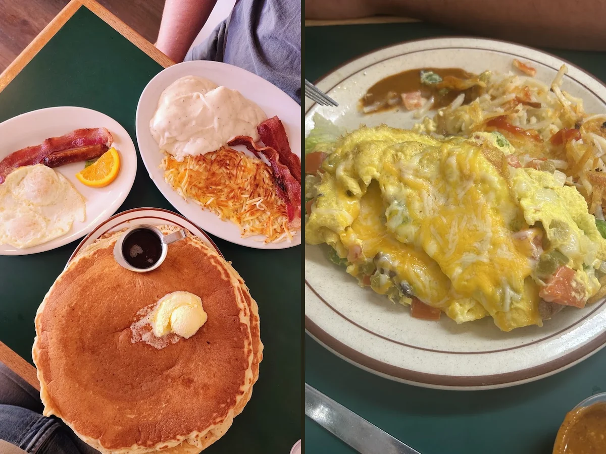 Plates of hearty breakfast food on a table.